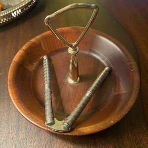 Mid century modern walnut nut bowl with a nut cracker.